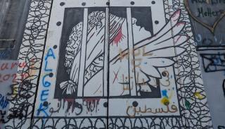 Mural on the apartheid wall in Bethlehem. Image courtesy Dr Annapurna Menon