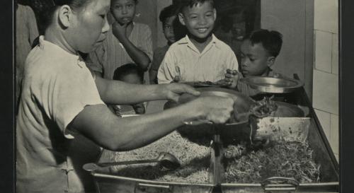 Colonial Malaya - Children receive free food at Kuala Lumpur clinic